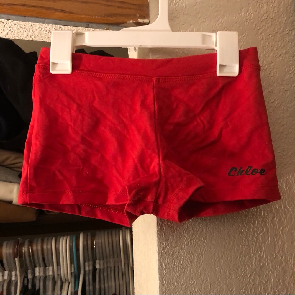 red gymnastics / dance shorts